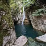 The first waterfall at the Black Cave gorge.